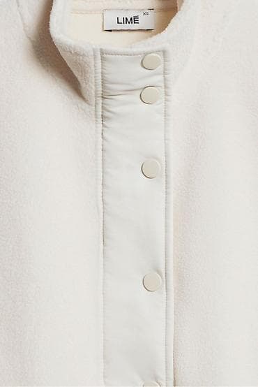 helly hansen: Женский бомбер Lime из мягкого флиса (цвет: молочный/айвори) — 4