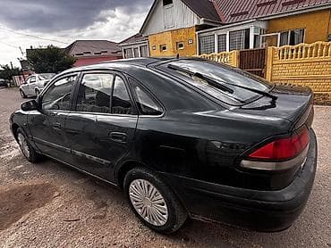 Унаа сатуу: Mazda 626: 1997 г., 1.8 л, Кол менен иштөөчү, Бензин, Хетчбек — 2