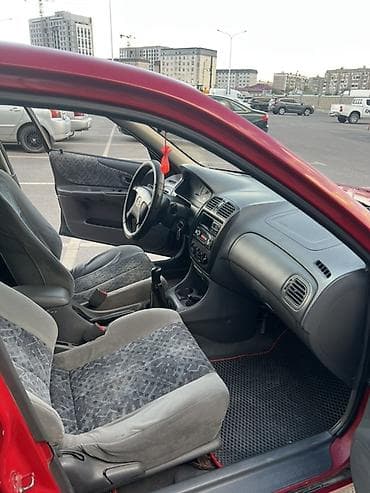 авто лейлек: Mazda 323: 1998 г., 1.5 л, Кол менен иштөөчү, Бензин, Универсал — 10