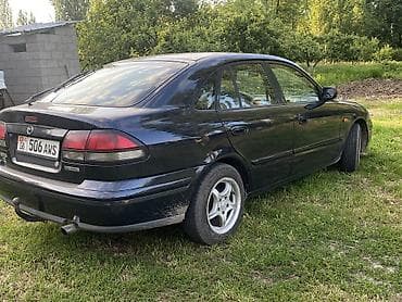 одиссей ремонт: Mazda 626: 1997 г., 1.8 л, Механика, Бензин, Хэтчбэк — 3