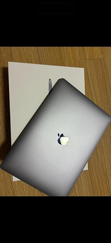 Apple MacBook (Space Gray) - Легкий и тонкий алюминиевый корпус в