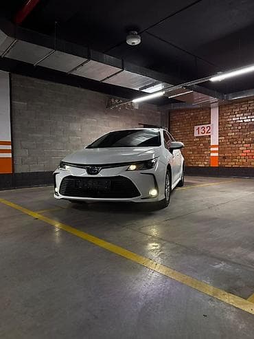 lexus e: Toyota Corolla: 2019 г., Автомат, Гибрид, Седан — 2