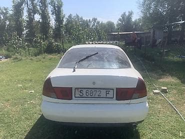 Mitsubishi Carisma: 1995 г., 1.8 л, Механика, Бензин, Седан — 2