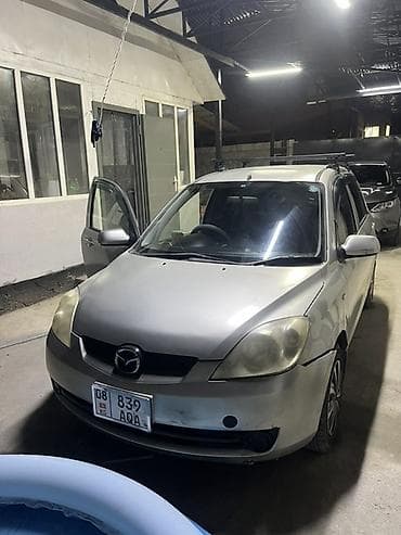 Mazda Demio: 2005 г., 1.3 л, Автомат, Бензин, Хэтчбэк
