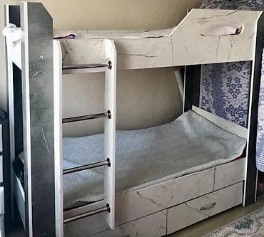 Кровати: Продаётся двухъярусная детская кровать (Б/У) Состояние отличное. В — 2