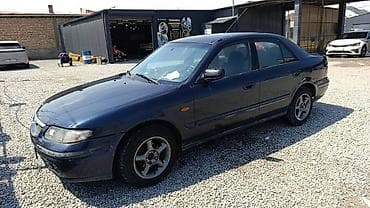 глушитель насадка: Mazda 626: 1998 г., 1.8 л, Механика, Бензин, Седан — 4