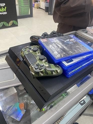 Sony PlayStation: Игровая консоль Sony PlayStation 4 (PS4) с комплектом аксессуаров и — 1