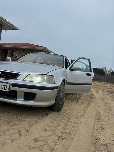 отделка салона авто: Honda Civic: 1998 г., 1.6 л, Автомат, Бензин, Седан — 9