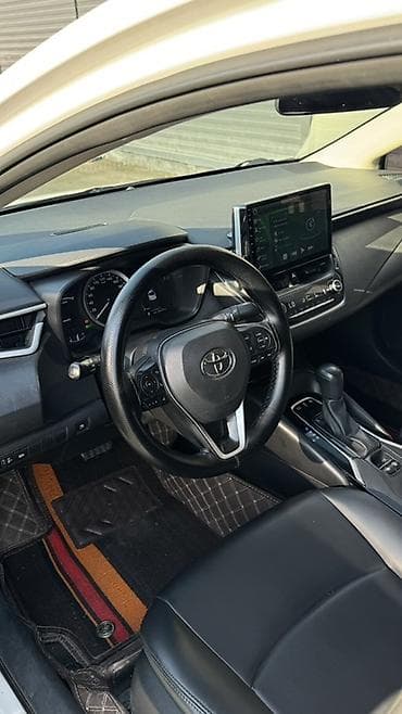 byd e2 2023: Toyota Corolla: 2022 г., 1.8 л, Вариатор, Гибрид, Седан — 5