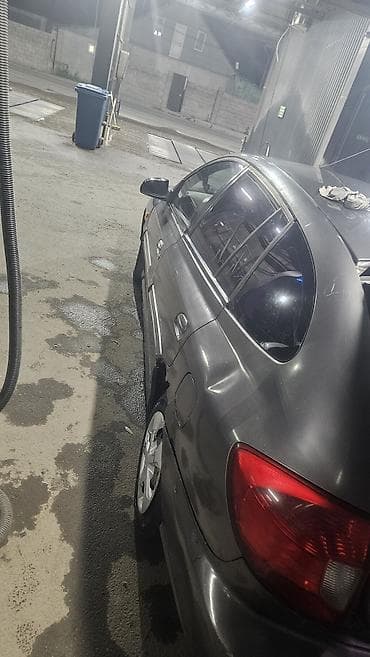 решетка к5: Kia Rio: 2003 г., Механика, Бензин, Хэтчбэк — 5