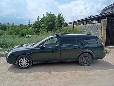 8: Ford Mondeo: 2003 г., 1.8 л, Механика, Газ, Универсал — 5