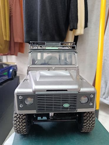Модели автомобилей: Радиоуправляемая модель внедорожника Land Rover Defender 90 (New — 3