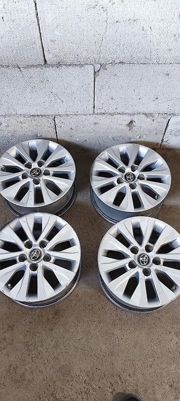 Комплект оригинальных литых дисков Toyota (4 шт.) - Диаметр: 15"