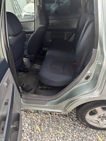 машина самара: Mazda Demio: 2003 г., 1.3 л, Автоматтык, Бензин, Универсал — 11