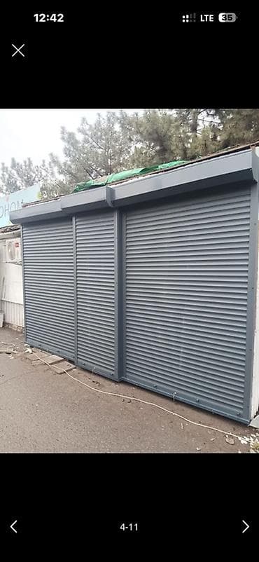 вскрытие капота: Роллеты и секционные ворота под заказ - Изготовление и монтаж уличных — 7