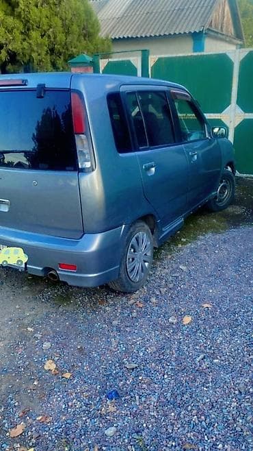 соко мтз: Nissan Cube: 1999 г. — 5