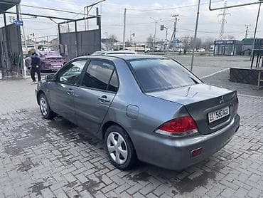 мицубиши лансер: Mitsubishi Lancer: 2005 г., 1.6 л, Автомат, Бензин, Седан — 5