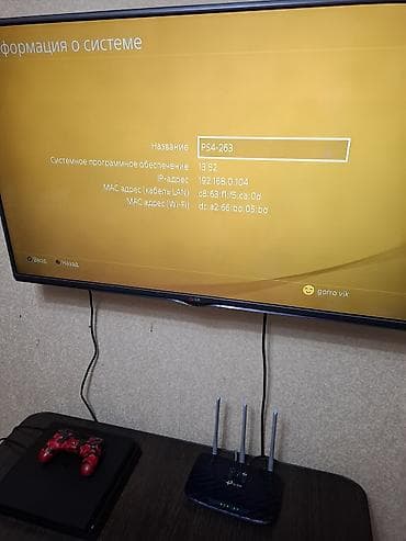 fc25 ps4: PlayStation 4 Slim, модель PS4-263. Игровая приставка в черном — 1