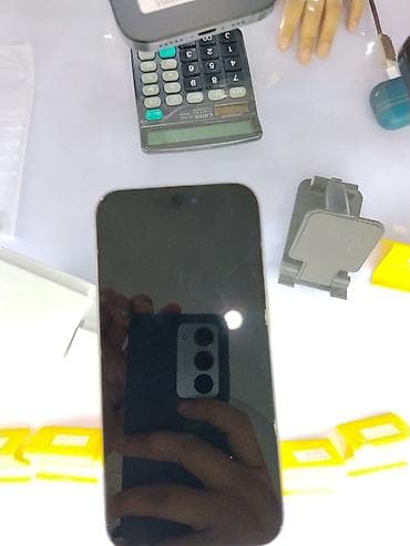 iphone 20: IPhone 15 Pro, 256 ГБ, цвет Natural Titanium. На стикере указано — 2