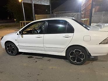 Транспорт: Mitsubishi Lancer: 2005 г., 2 л, Механика, Бензин, Седан — 4