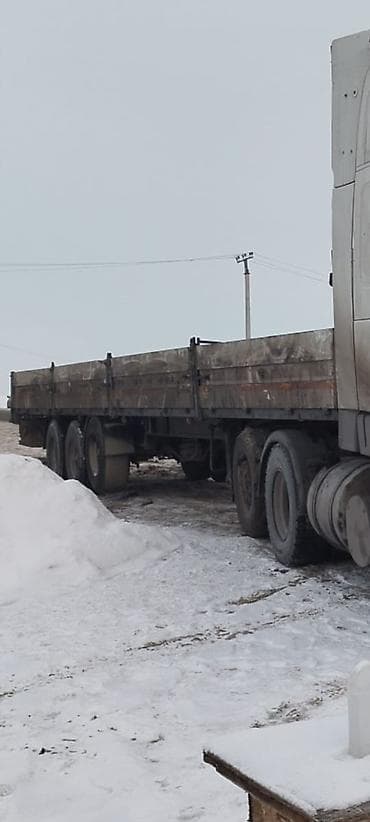 вагон рама: Полуприцеп-площадка (бортовой) 3-осный Описание: - Бортовой — 2