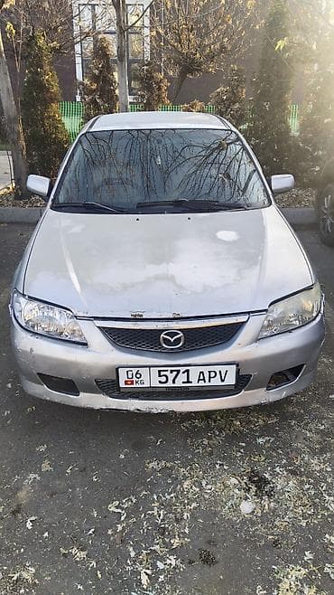 женский машина: Mazda 323: 2002 г., 1.6 л, Автомат, Бензин, Хэтчбэк — 7