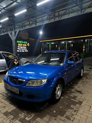 Mazda Familia: 2001 г., 1.6 л, Механика, Бензин, Седан