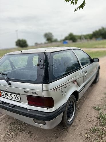 скутер для воды: Mitsubishi Colt: 1989 г., 1.5 л, Механика, Бензин, Хэтчбэк — 4