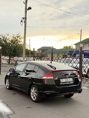 Honda Insight: 2010 г., 1.3 л, Вариатор, Гибрид, Фастбек — 4