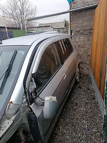 универсал 210: Hyundai Getz, серебристый хэтчбек 5 дв. - Компактный городской — 4