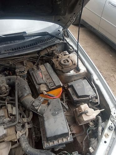 mini car: Mazda Familia: 2003 г., Универсал — 8