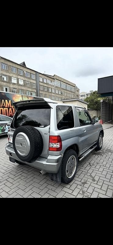 Транспорт: Mitsubishi Pajero iO: 1999 г., 1.8 л, Автомат, Бензин, Кроссовер — 1