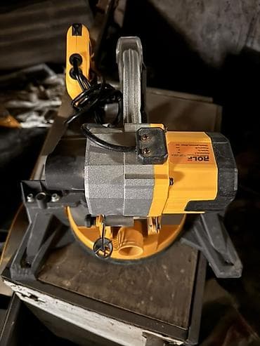 Пилы: Торцовочная пила ROLF (модель на шильдике: ROLF T0?-3?5A — надпись — 2