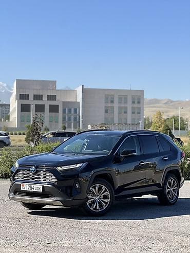 byd e2 2023: Toyota RAV4: 2023 г., Гибрид, Кроссовер — 1