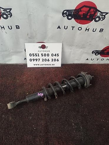 d 4d: Передний амортизатор Toyota 2005 г., Оригинал — 1