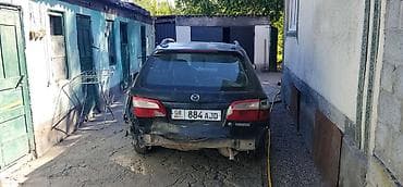 Продажа авто: Mazda Familia: 1999 г., 1.5 л, Механика, Бензин, Универсал — 3
