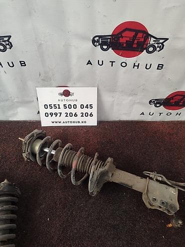 Передний амортизатор Mazda 2003 г., Оригинал