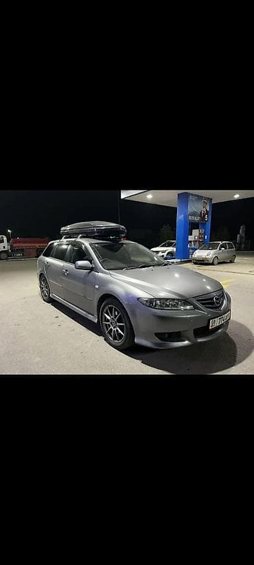 Транспорт: Mazda Atenza: 2004 г., 2.3 л, Автомат, Газ, Универсал — 1
