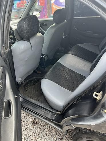 тез арада: Nissan Primera: 1991 г., 1.6 л, Кол менен иштөөчү, Бензин, Седан — 7