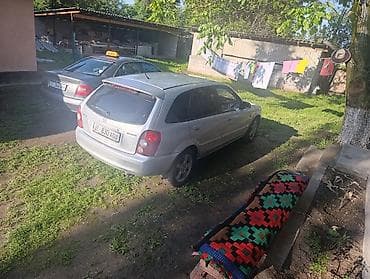 fermer kg: Mazda 323: 2002 г., 1.6 л, Автомат, Газ — 2