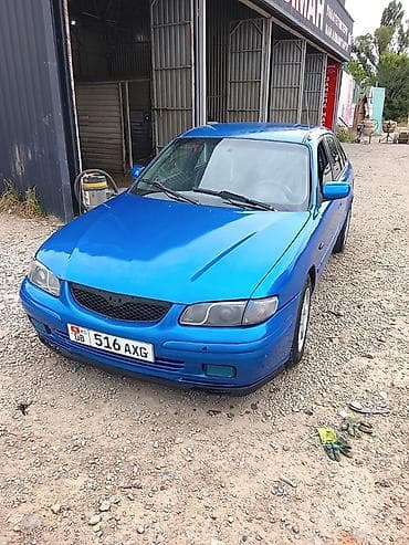 маркер для авто: Mazda 626: 1998 г., 2 л, Механика, Бензин, Седан — 2