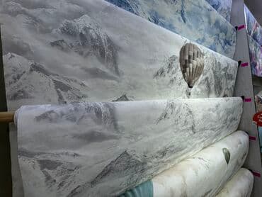 картина настенная: Рулон обоев с рисунком горного пейзажа и воздушного шара. Изображение — 1