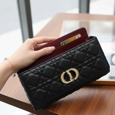 кожанный кошелек: Черный кожаный кошелек с золотистой фурнитурой. Размер 19 см. Модель — 1