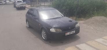 roewe rx5: Mazda 323: 2000 г., 1.8 л, Механика, Бензин, Универсал — 2