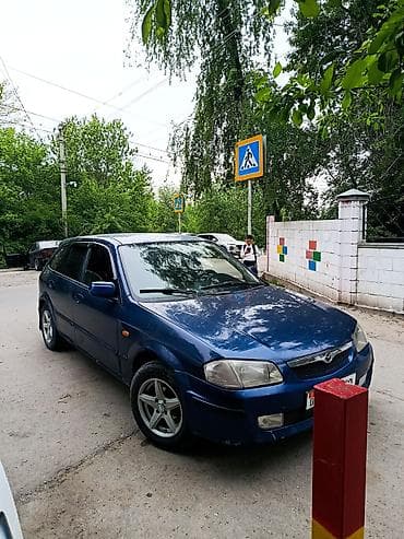 Mazda 323: 2001 г., 1.6 л, Автомат, Бензин, Универсал