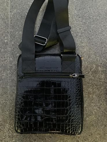 Барсетка копия Butun, идеальное состояние. Цена 1500 at lalafo.kg Барсетка копия Butun, идеальное состояние. Цена 1500