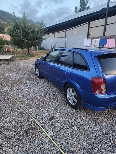 Продажа авто: Mazda Familia: 2002 г., 1.5 л, Автомат, Бензин, Хэтчбэк — 5