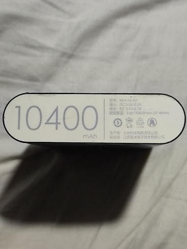 повербанк 10000 mah цена: Xiaomi Mi Power Bank 10400 мАч - Емкость: 10400 мАч (37,44 Wh) - — 3