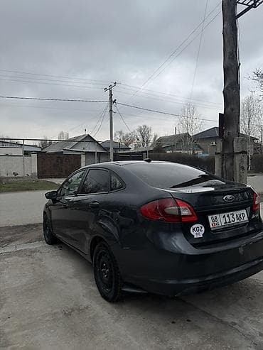 golf v: Ford Fiesta: 2011 г., 1.5 л, Вариатор, Бензин, Седан — 6