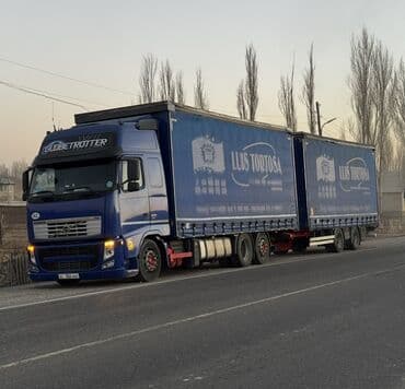 дом на колясах: Тягач, Volvo, 2011 г., Шторный — 8